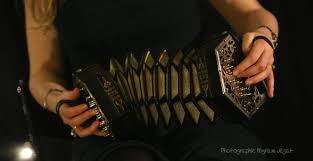 Image of Caitlin with her Concertina